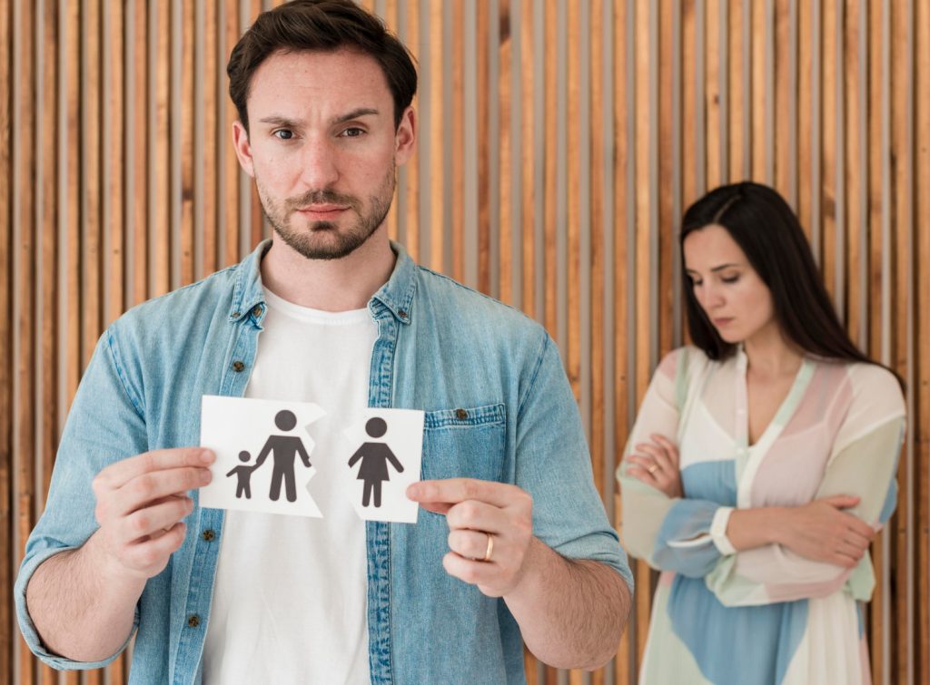 Man holding family paper