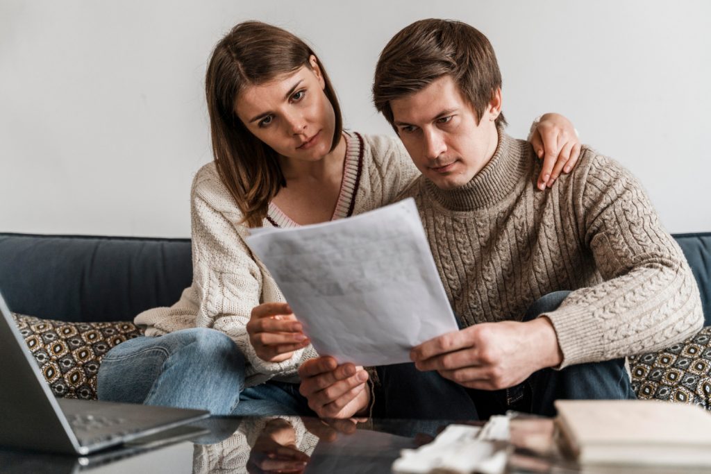 Couple reading a document