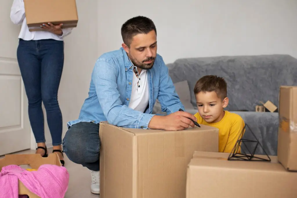 Father and kid packing