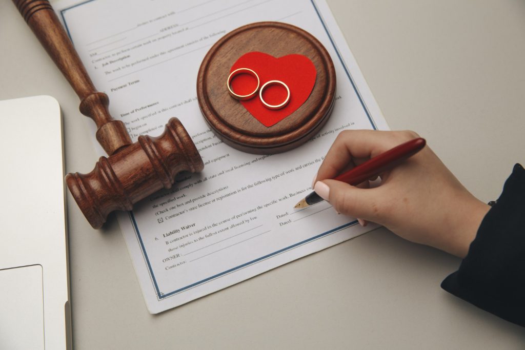 Woman signing marriage contract